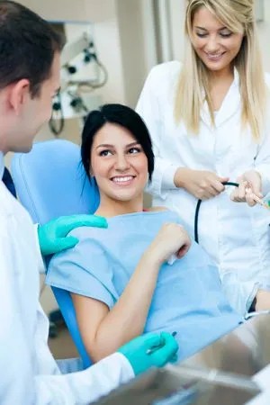 smiling woman in dental chair